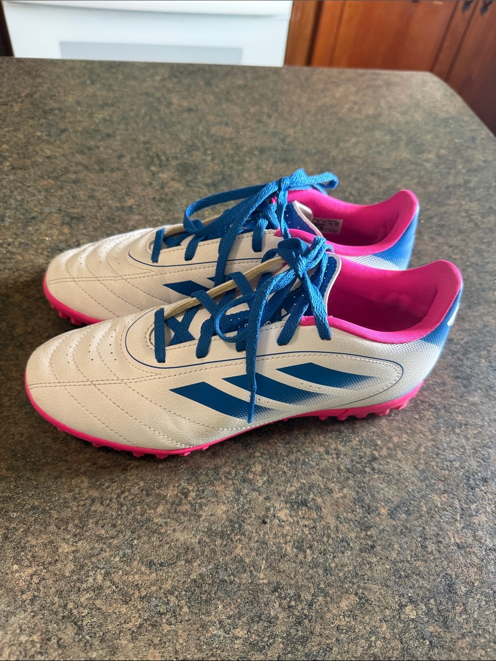 ADIDAS White Soccer Turf Shoes with Blue Stripes and Pink Accents